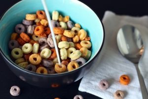 bowl of artificially colored breakfast cereal