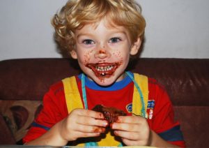 Boy eating cake