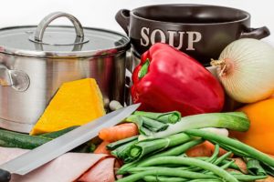 Soup pots and vegetables