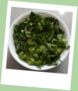 Bowl of chopped celery and leaves